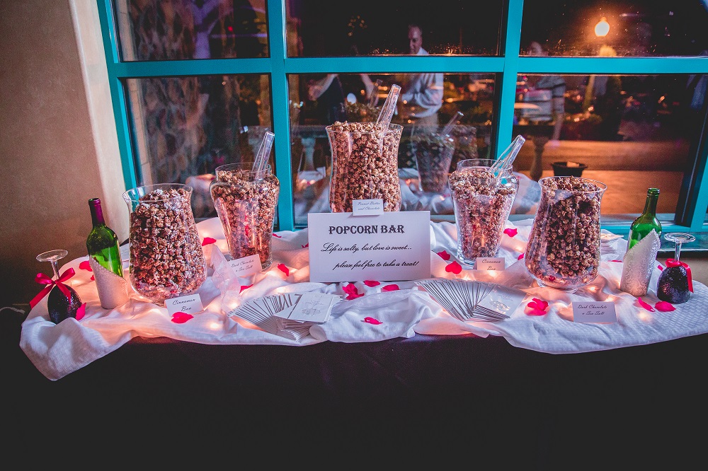 A popcorn bar is perfect for weddings, showers, birthdays, graduations, holiday celebrations, and business events. Select the flavors of your choice and we’ll take care of supplies, set-up, and clean up OR use our delicious popcorn to create your own bar!